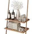 Wooden Bath Rack with Rolled Towels Stacked Towels Wash Products and White Flowers