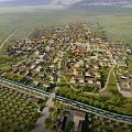 Aerial View Of Dense Residential Housing Area With Roads And Green Spaces