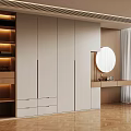 Modern Closet Design With White Cabinets Drawers Illuminated Shelves Round Mirror And Wooden Floor