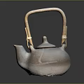 Handcrafted Traditional Clay Teapot with Bamboo Handle on Dark Reflective Surface