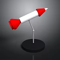 Space Rocket Model With White Red Design And Black Base Metal Spring Stand