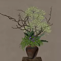 Terracotta Vase With White Flowers Purple Blooms Green Leaves And Twigs On Brown Wall Background