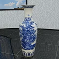 Blue And White Decorative Vase With Landscape Floral Patterns On Dark Tiled Floor