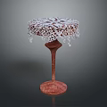 Red Marble Round Table Furniture With Tall Pedestal Base And White Lace Fringed Tablecloth