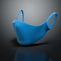 Blue Protective Face Mask With Elastic Ear Loops On Dark Surface 3d model
