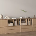 Modern Light Wood Storage Cabinet With Open Shelves Drawers Books Decor Plant On Wooden Floor