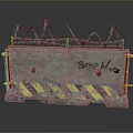 Concrete Barrier With Barbed Wire Stop War Graffiti And Yellow Black Warning Stripes