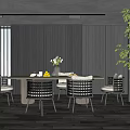 Modern Restaurant Dining Area With Wooden Table Rattan Chairs And Green Plant Decor