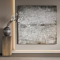 Textured Abstract Painting On Wall With White Flowers In Vase And Wooden Pedestal