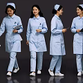 Professional Female Nurses In Blue Uniforms Walking With Medical Documents