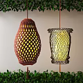 Red And Black Woven Lanterns With Intricate Patterns Hanging With Green Plants