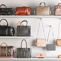 Stylish Assorted Handbags in Various Colors Displayed on White Shelves