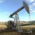 Industrial Oil Pump for Oil Extraction in Open Field With Mountainous Landscape and Blue Sky