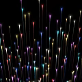 Colorful Slender Decorative Lights Brightly Illuminated on Black Background Design