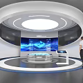 Modern Tech Exhibition Hall Featuring Circular Platform Large Screen Data Charts and Interactive Screen