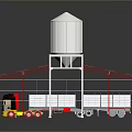 Truck Parked Under Metal Framework With Two White Silos In Industrial Area