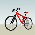 Red Mountain Bike With Black Handlebars Brown Seat And Large Tires