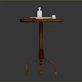 Daily Necessities Arranged On Wooden Round Side Table With Tray And Small Bottle