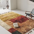 Colorful Block Pattern Square Rug With Tassels And Wooden Chair In Bright Room
