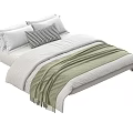 Modern Double Bed With White Bedding Striped Pillow And Green Blanket