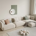 Beige Sectional Sofa with Colorful Cushions Throw Blanket and Modern Wall Art in Minimalist Interior