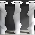 Three Twisted White Pillars With Modern Spiral Design And Dark Background