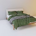 Minimalist Double Bed With Light Green Quilt Gray Blanket Pillows And Wooden Frame