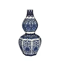 Blue and White Gourd Shaped Ceramic Vase With Intricate Patterns And Golden Base