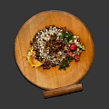 Fresh Mixed Salad With Tomato Mint Leaves And Lemon On Wooden Cutting Board