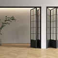 Modern Interior Space With Black Frame Glass Folding Doors And Wooden Floor