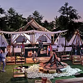 Luxury Glamping Site With Canvas Tents Bonfire String Lights And Outdoor Gathering