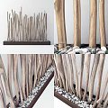 Natural Wooden Room Divider Featuring Vertical Sticks Dark Base And Pebbles