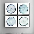 Four Tree Ring Artworks in Blue White Tones with Black Frames Hanging on Wall 3d model