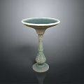 Tall Carved Green Pedestal Vase With Intricate Decorative Base And Rim