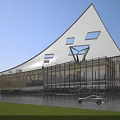 Modern School Building With Unique Roof Structure Glass Windows Green Grass And Trees