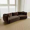 Brown Velvet Abstract Shape Sofa With Cozy Cushions In Natural Light On Light Wooden Floor
