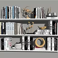 Decorative Ornament Set on Bookshelf with Books Gold Bird Figurine Circular Decor and Stacked Plates