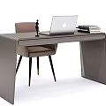 Modern Home Office Desk Setup With Laptop Table Lamp Chair And Stacked Books