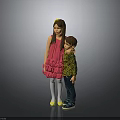 Two children snuggling girl in pink dress and boy in green top against grey background