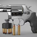 Silver Revolver With Open Cylinder And Bullets On Gray Surface