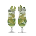 Two Refreshing Drinks with Lime Lemon Mint Leaves and Ice Cubes in Tall Glasses