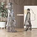 Modern Metal Human Sculptures In Interior With Plant And Decorative Painting