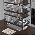 Sturdy Metal Storage Shelf with Books Notebook Calculator and Small Decor on Office Desk