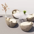 Round Wicker Outdoor Sofa With White Cushions Table And Plants For Patio