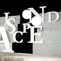 Large Three Dimensional Letters ISND SPACE On Gray Steps With Shiny Wall Background 3d model