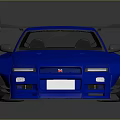 Blue Modified Sports Car With Rear Spoiler And Orange Wheels