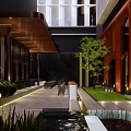 Modern Commercial Landscape With Courtyard Water Feature Green Plants And Lighting