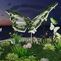 Stunning Butterfly Sculpture Photo Spot With Green Plants Flowers And Sunset Sky