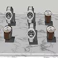 Elegant Mechanical Watches with Metal and Brown Leather Straps on Marble Tabletop