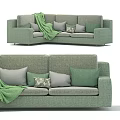 Modern Green Sectional Sofa With Decorative Pillows And Throw Blanket 3d model